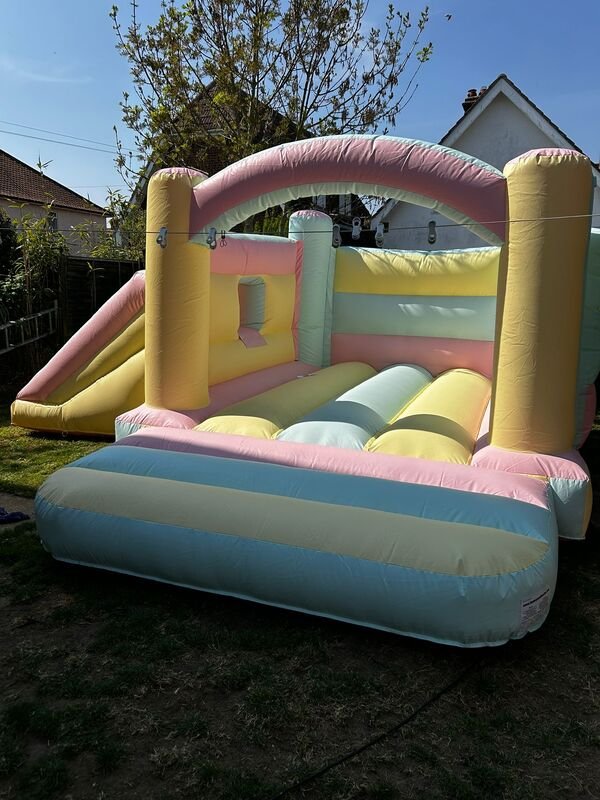Pastel bouncy castle with slide and ball pool - Soft colored castle for gentle play in Harwich and Clacton